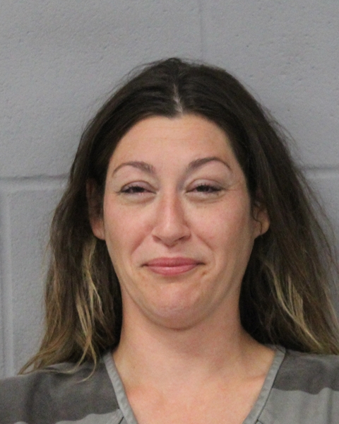 CHERYL WOODMANSEE arrested in Austin, Texas