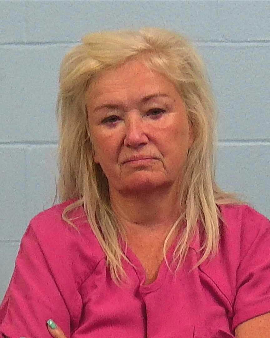 Clay, Olga booking photo