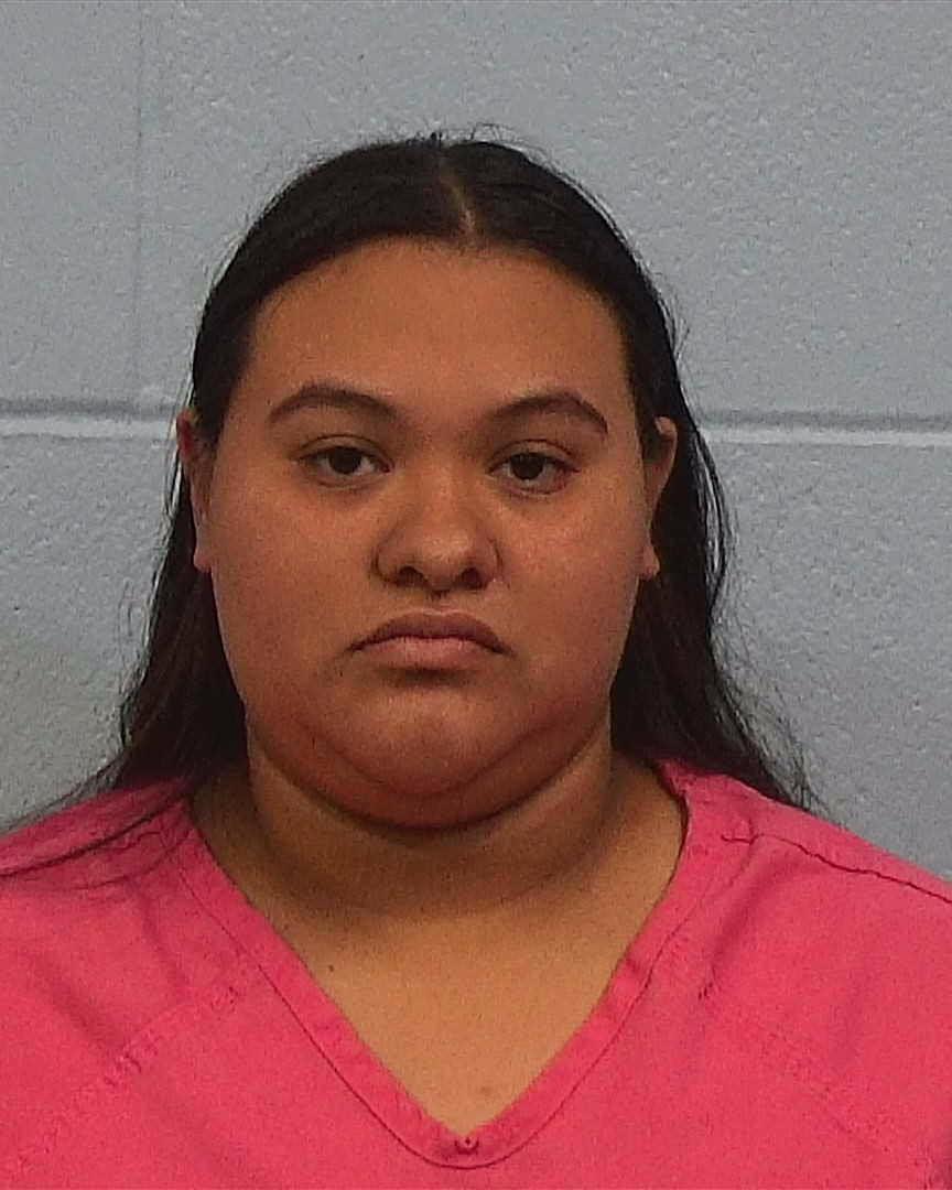 Gomez, Melain booking photo