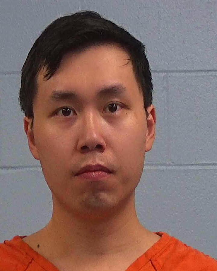 Chan, Zhao booking photo