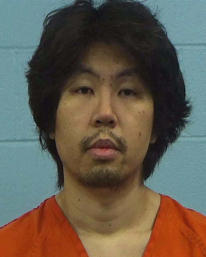 Chau, Clinton booking photo