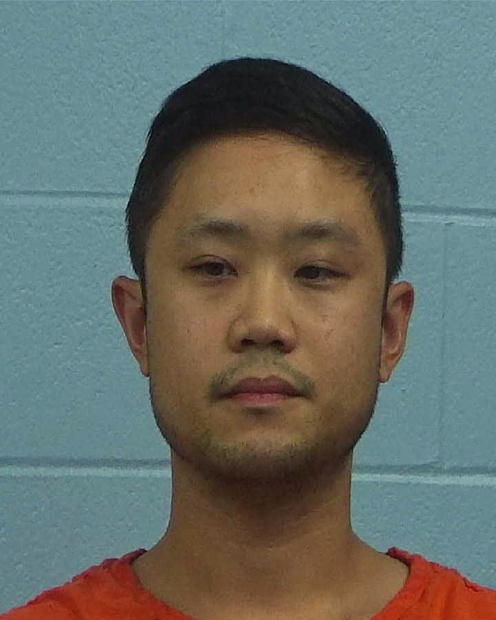 Nguyen, Johnson Quang booking photo