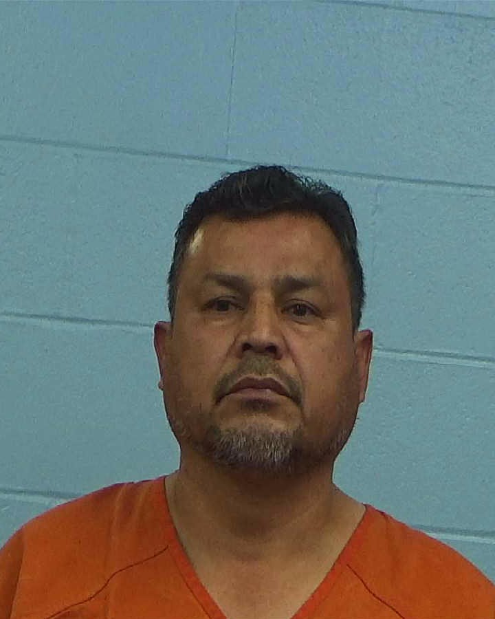 Juarez Minor, Manuel booking photo