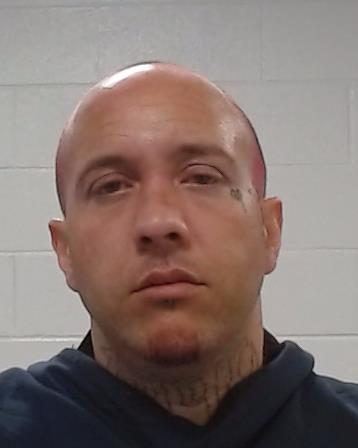 Norman, Anthony Champagne arrested by Collin County SO