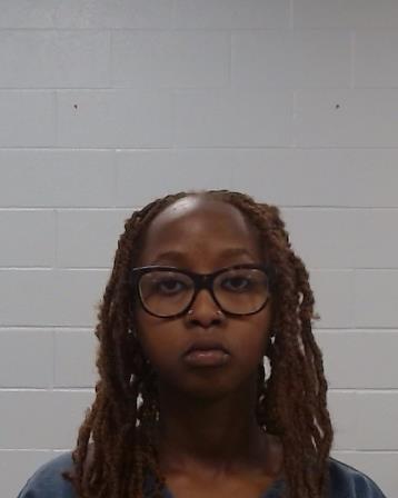 Wachira, Naomi Waturi booking photo
