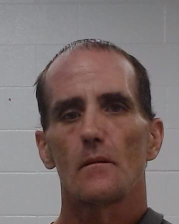 Simpler, Tony Dan booking photo