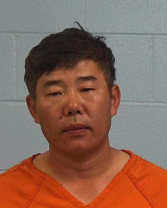 Kim, Dong booking photo