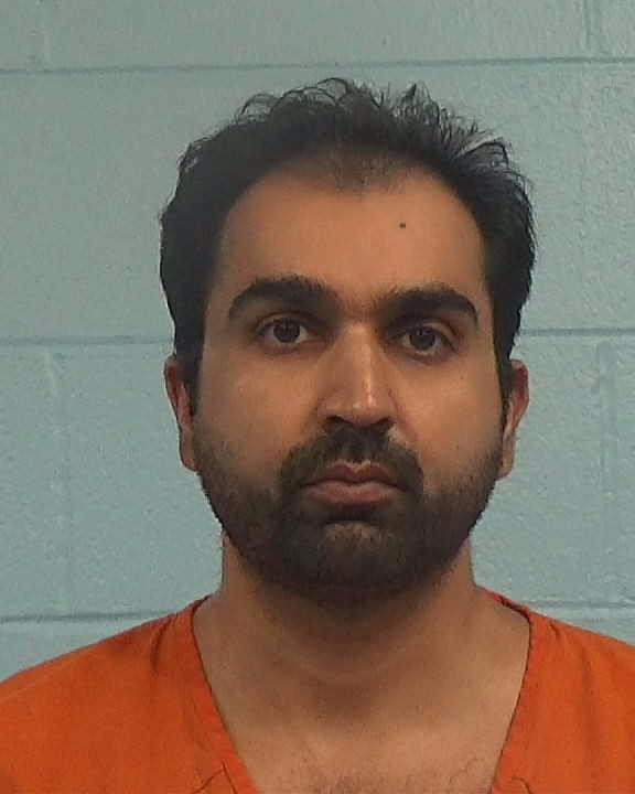 Khalid, Adeel booking photo