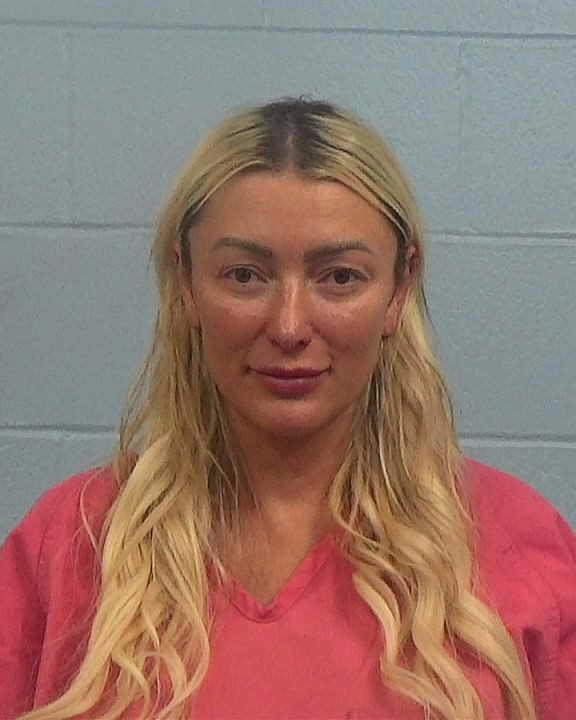 Spicer, Lora booking photo