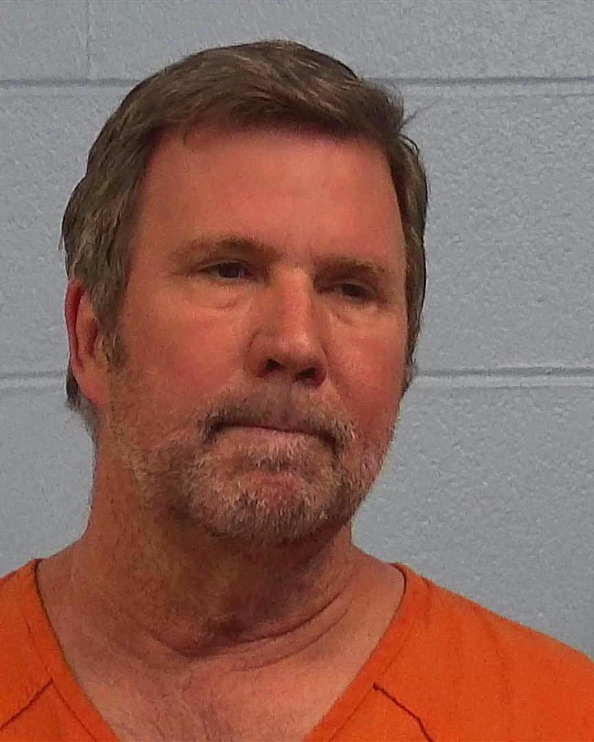 Lee, Mitchell booking photo