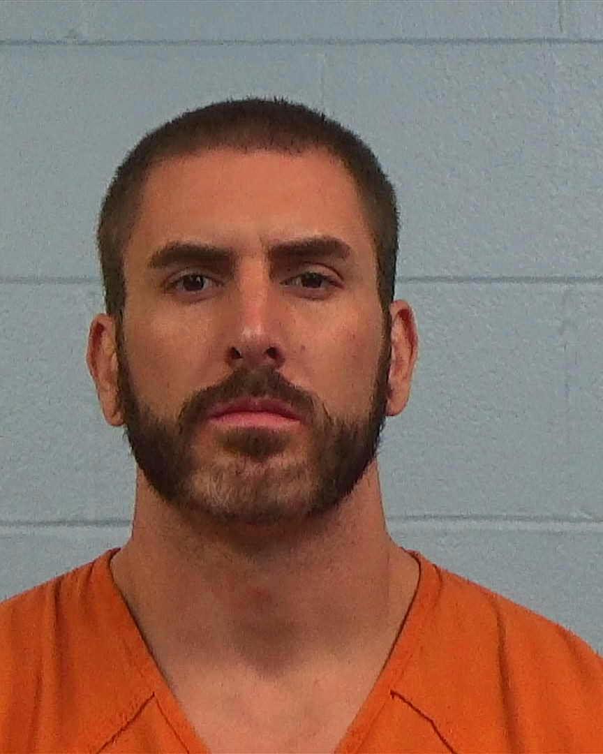 Johnson, Michael Mendoza booking photo