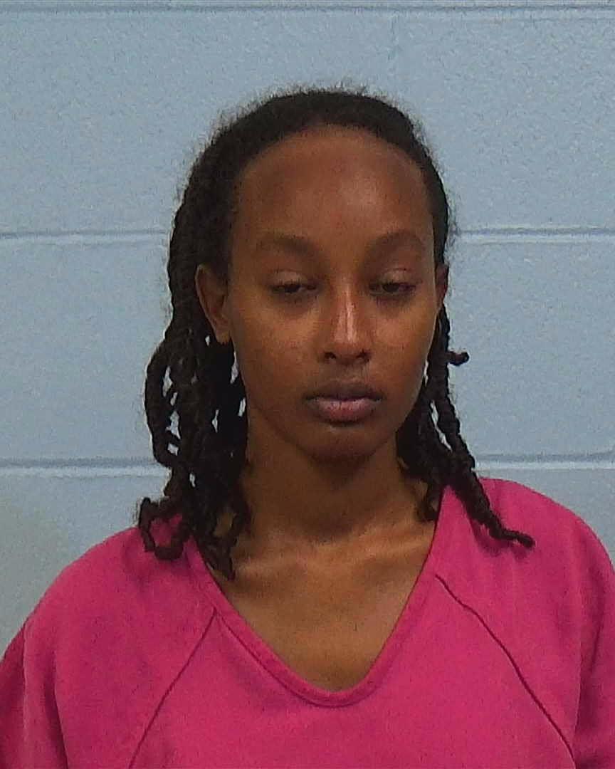 Reeves, Roman booking photo