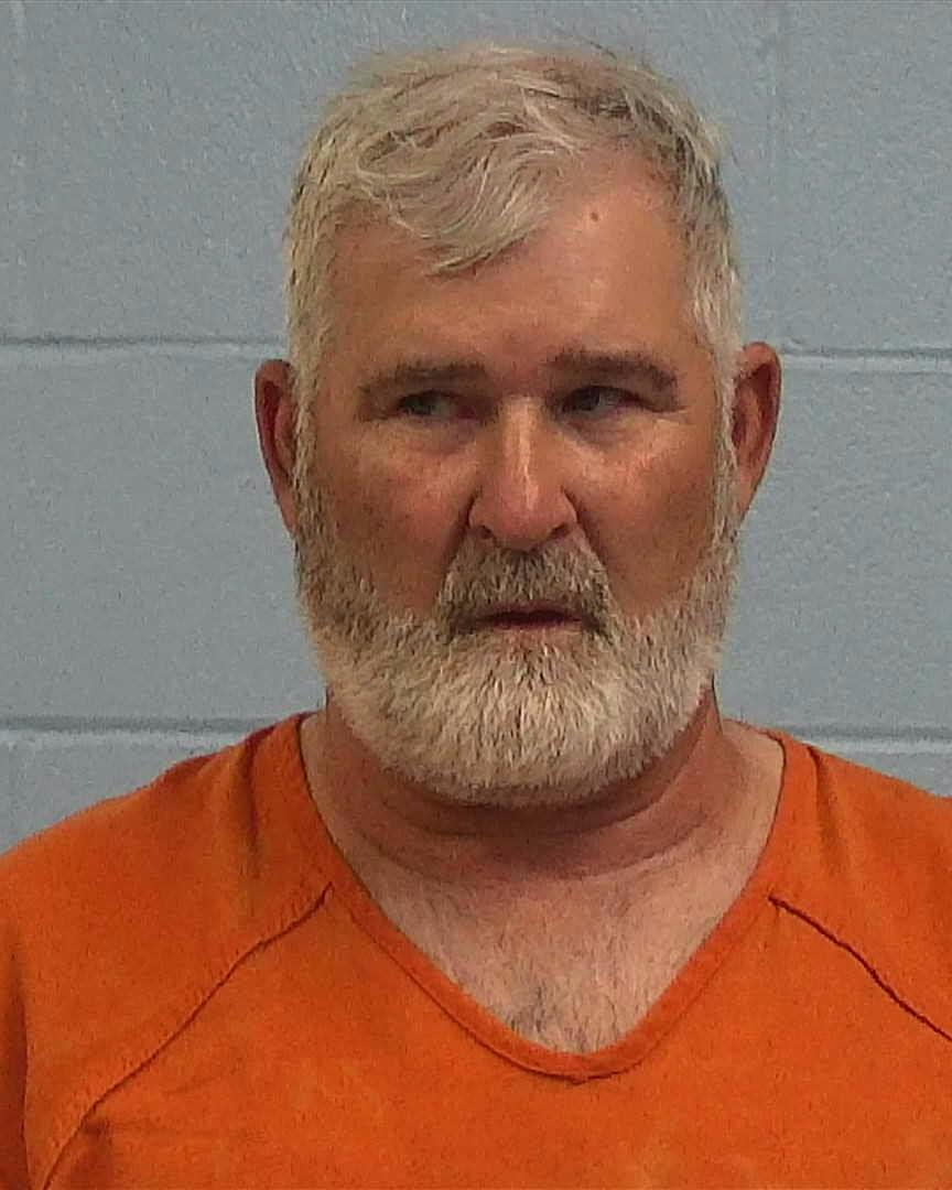 Reynolds, Charles Austin booking photo