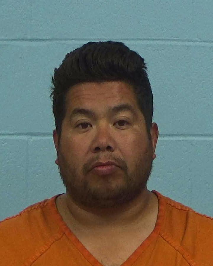 Luna, Paul booking photo