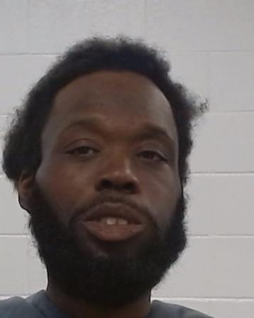 Greer, Anthony Quinn booking photo