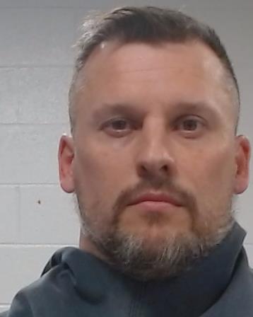 Black, Russell Williams booking photo