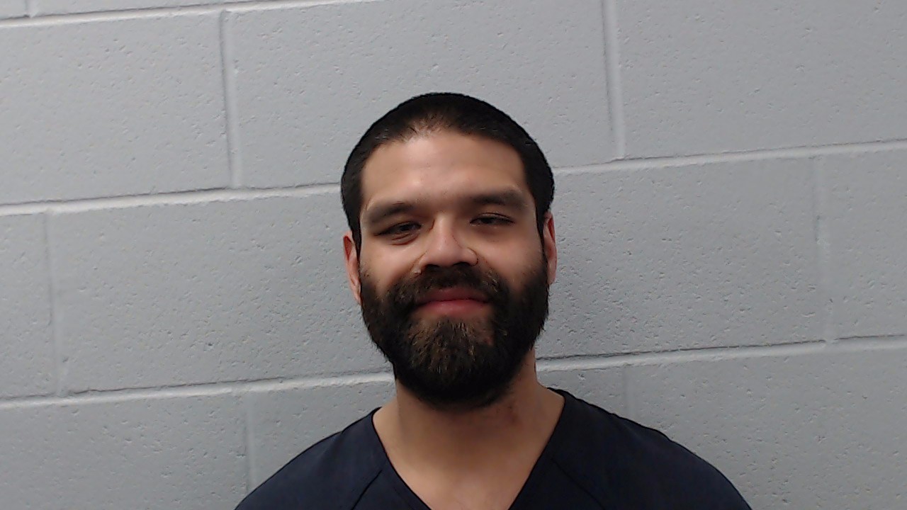 Amaya, Carlos Ocasio booking photo