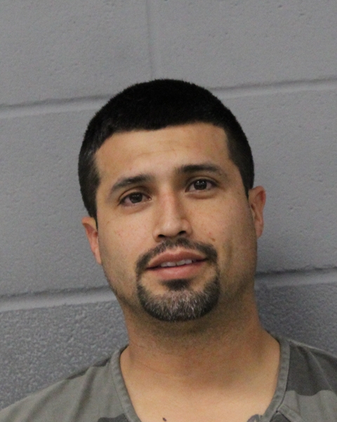 OSCAR SALGADO arrested by APD