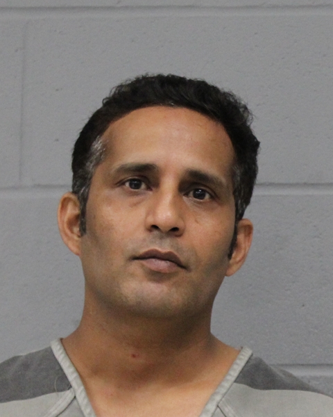 ATHER KHAM arrested by APD