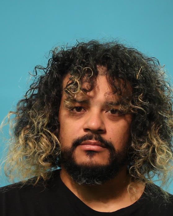 Lara, Uriel Albert booking photo