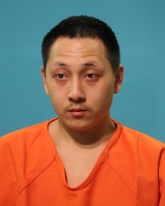 Tran, Christopher Jordan booking photo