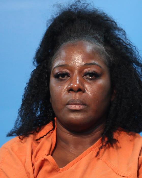 Richards, Siri booking photo