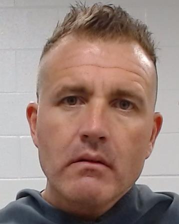 Tucker, Barrett Clark booking photo