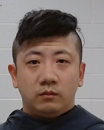 Cao, Zuotian booking photo