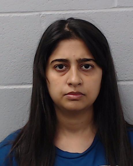 Tariq, Fatima booking photo