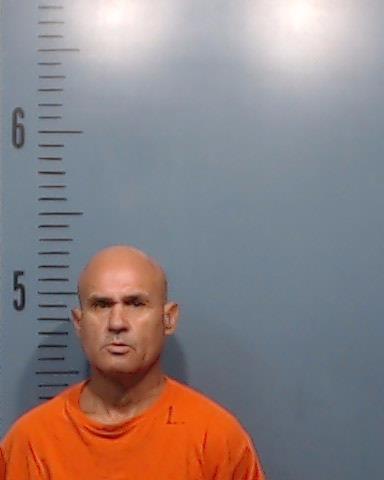 Flores, Corando, Jr. booking photo