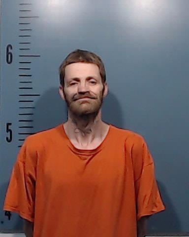 Zara, Charles Calvin booking photo