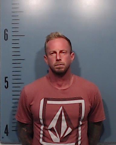 Eden, Jeremy Quaid booking photo