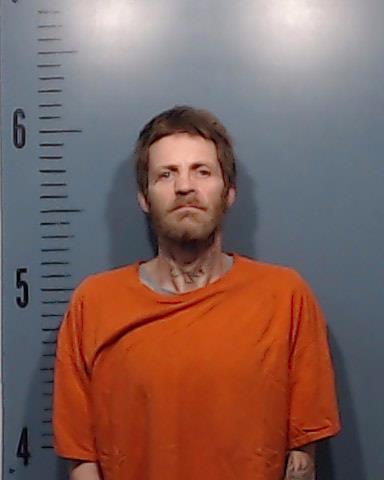 Zara, Charles Calvin booking photo