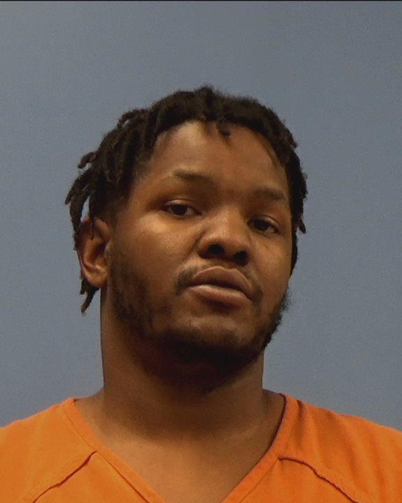 Maxie, Bruce Wayne booking photo