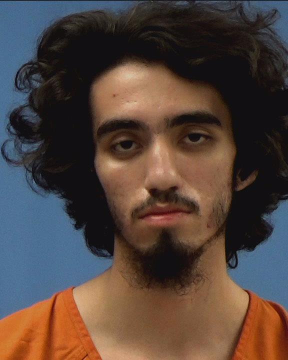 Wells, Simon Galan booking photo