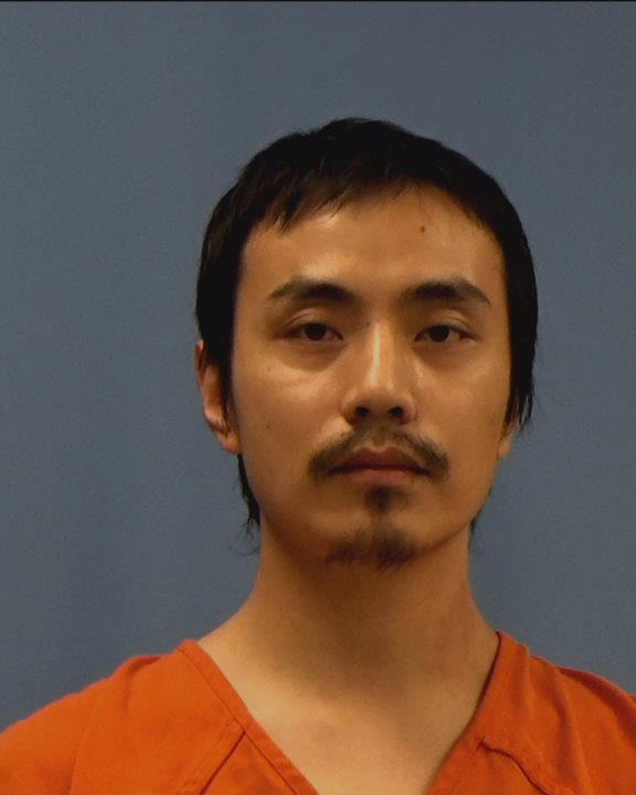 Zhou, Liang booking photo