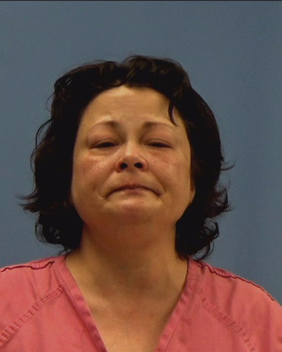 Sutton, Michele Suk booking photo