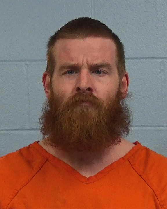 Sansom, Tyler Hamilton booking photo