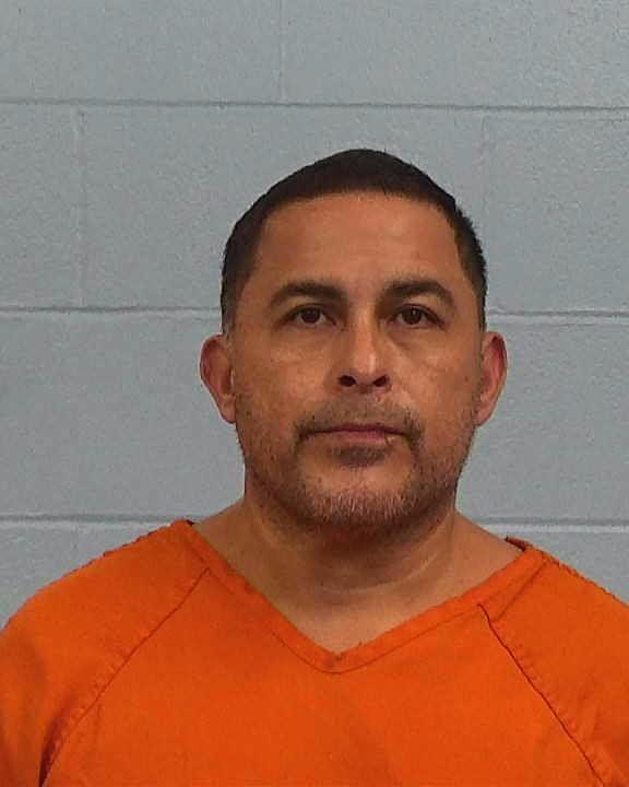 Nino, Efrain booking photo