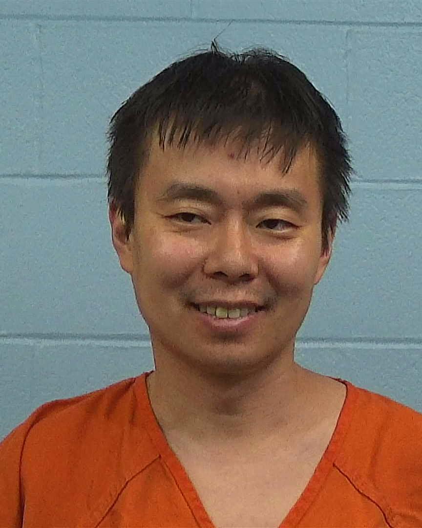 Qi, An booking photo