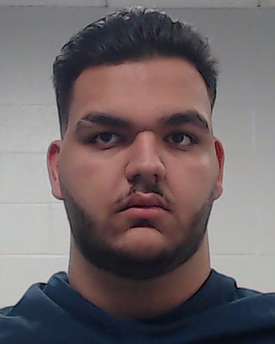 Nazham, Adam Yousuf booking photo