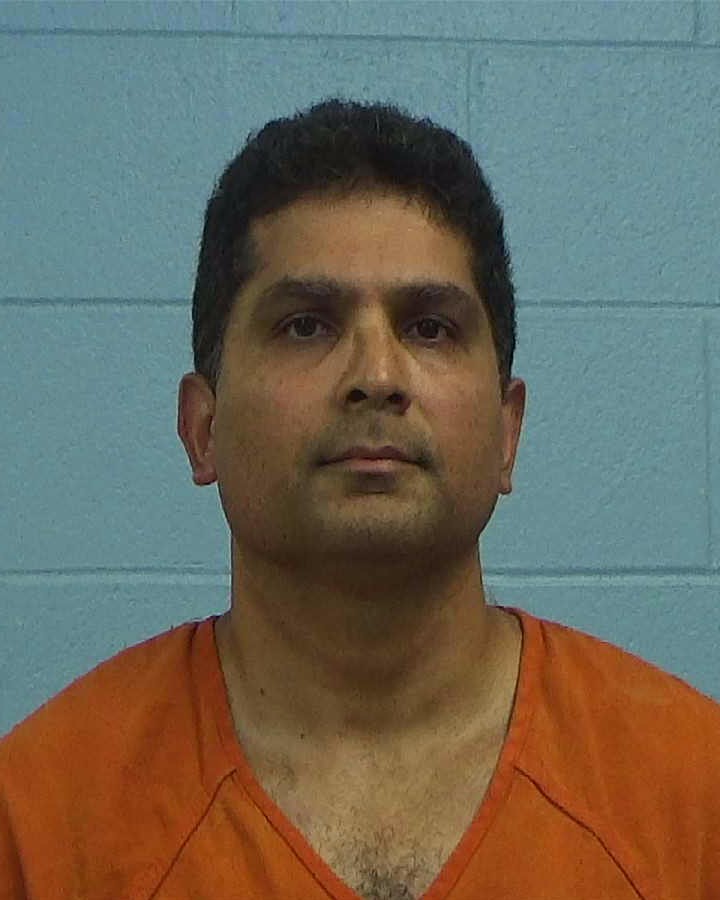 Arikath Radhakrishnan, Karthikeyan booking photo