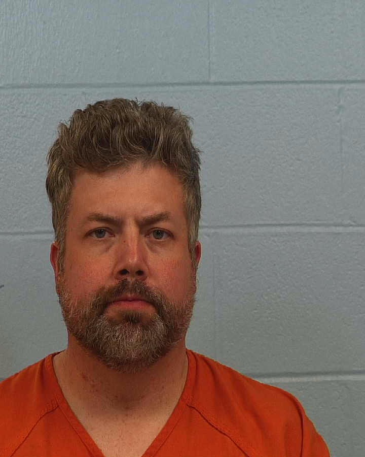 McNelly, John Brandon booking photo