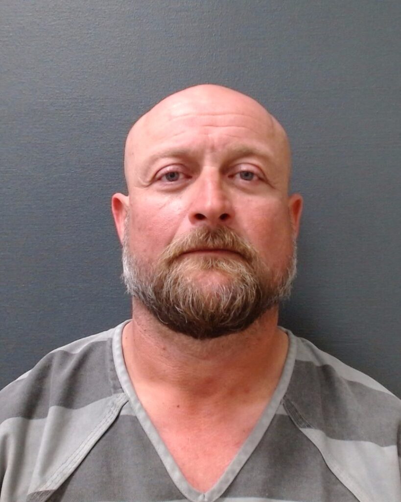 OLGUIN, CHRISTIAN MOSIES booking photo