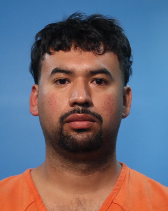 Vera, Edgar booking photo