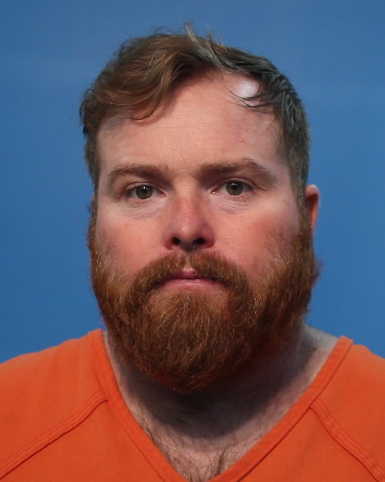 Poutre, Justin Evan booking photo