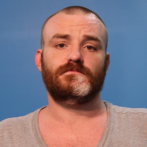 Logan, Justin Dakota booking photo