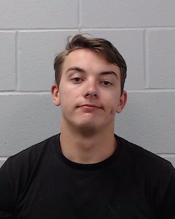 Miner, Dylan Thomas booking photo