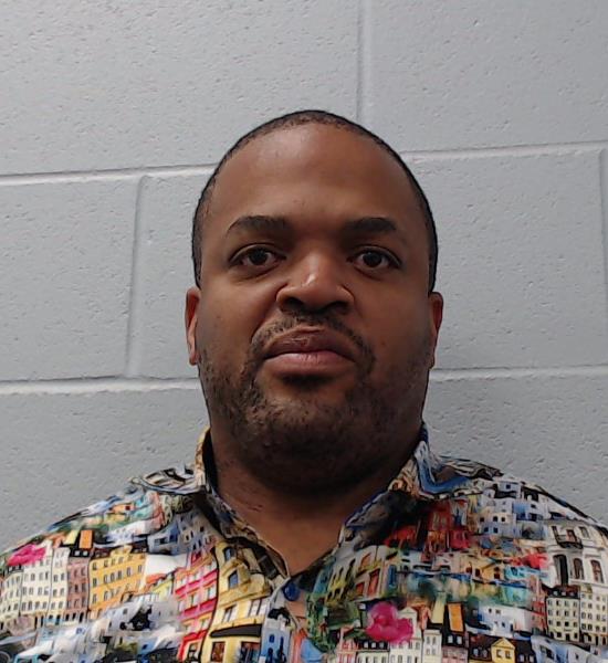 Lyons, Insukba Sambura booking photo