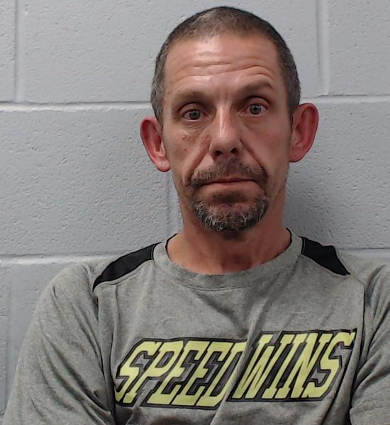 Guess, Justin Lee booking photo